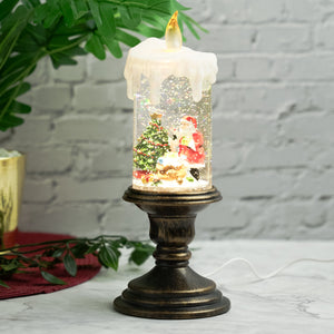 Holiday decorations, beautiful christmas snowglobe candle with lights and music, santa with reindeers by Accent Collection