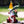 Green And Red Resin Gnome With Solar LED Torch Flame - Garden Figurine For Outdoor Delight by Accent Collection